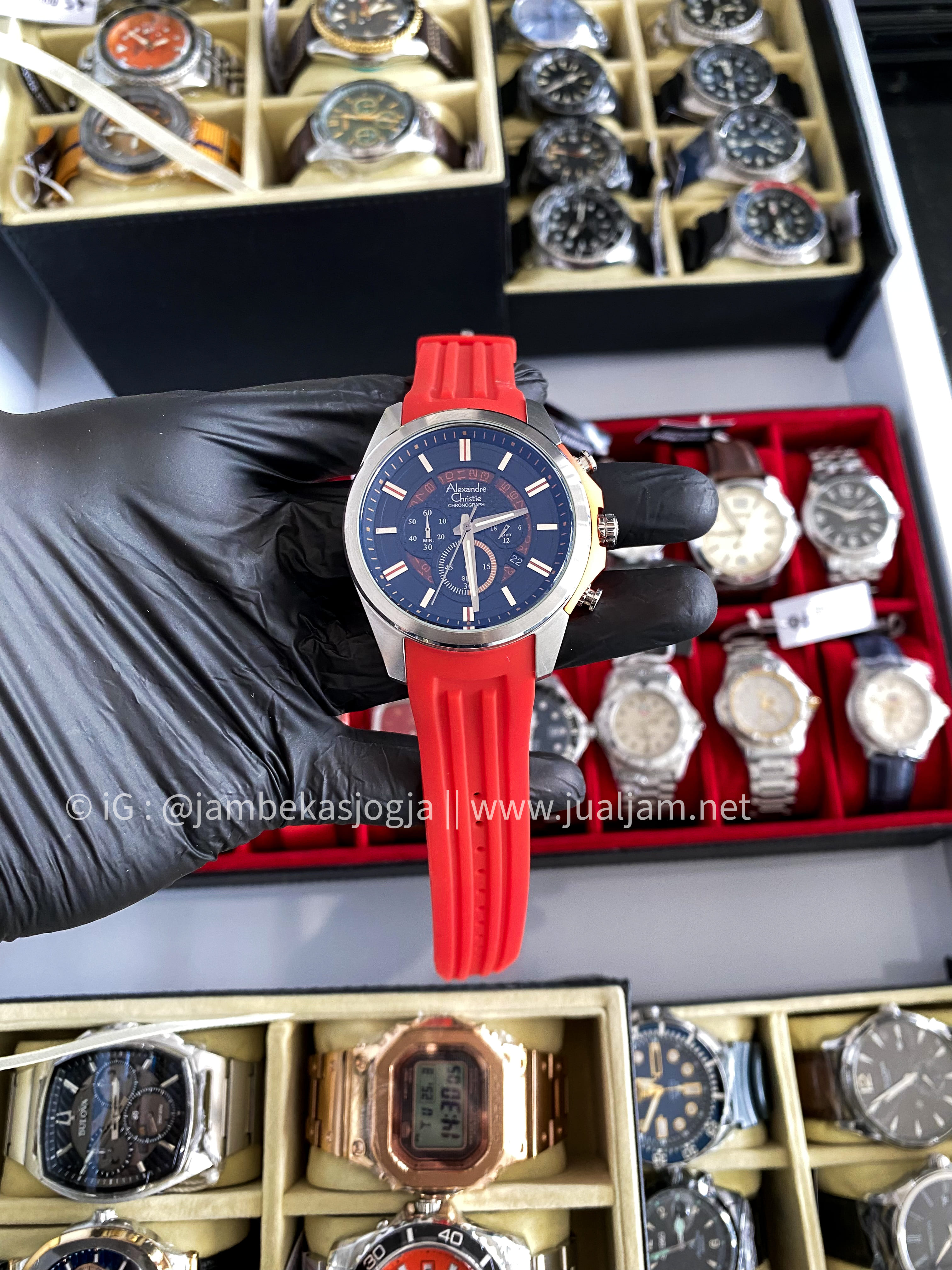 (SKU 178) Alexandre christie 6325MC original Red rubber Strap Black Dial