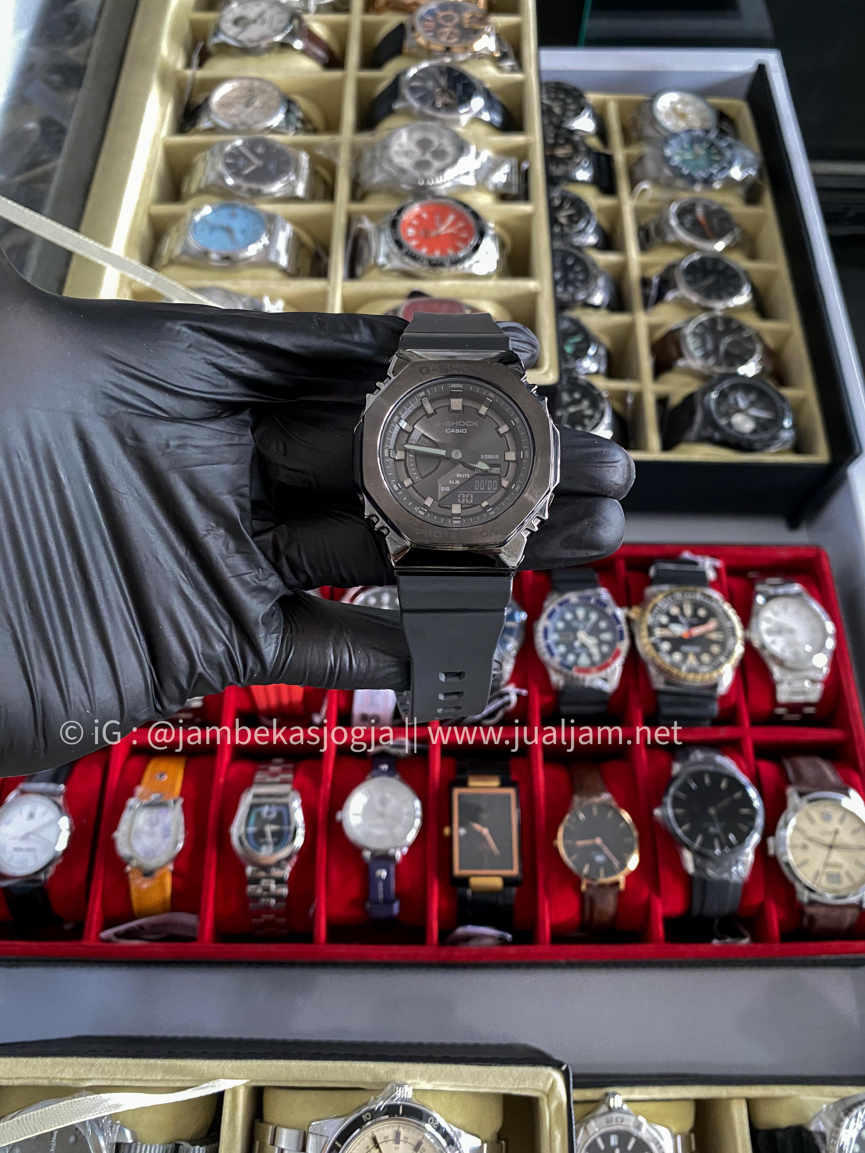 (SKU 227) Casio G-Shock X ITZY Metal Covered GM-S2100B-8ADR CasiOak Digital Analog Dial Dark Grey Resin Band