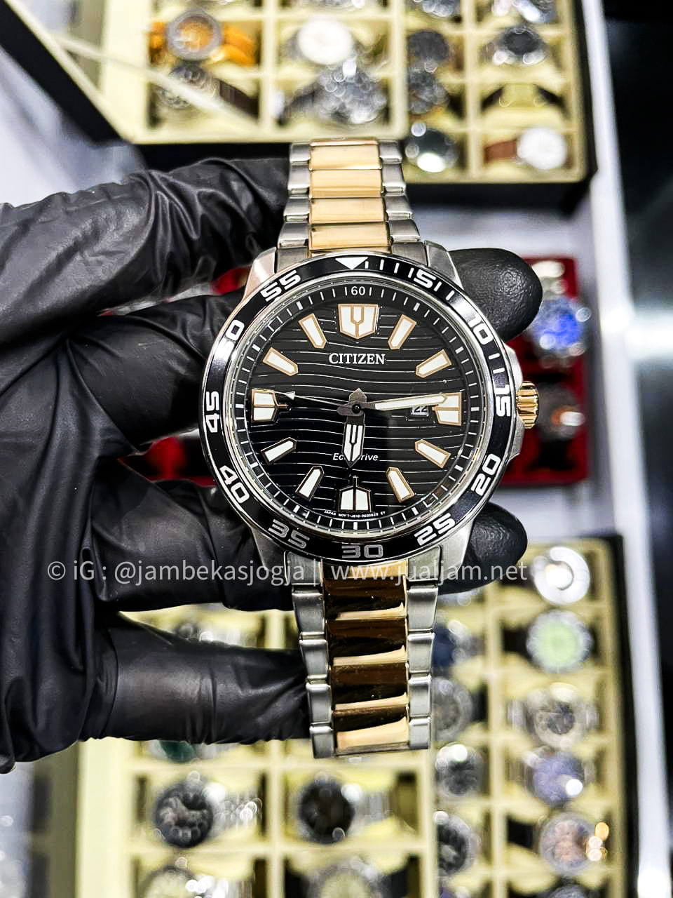 (SKU 456) Citizen Eco-Drive AW1524-84E Black Pattern Dial Dual Tone Stainless Steel Strap